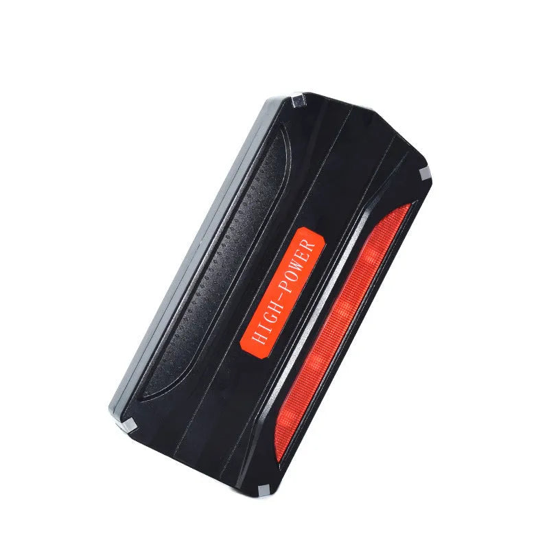 Black and red 12V vehicle emergency jump starter power supply unit with 7800mAh capacity.
