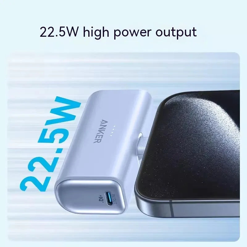 Compact capsule-shaped power bank in multiple colours with a fold-out USB-C cable.