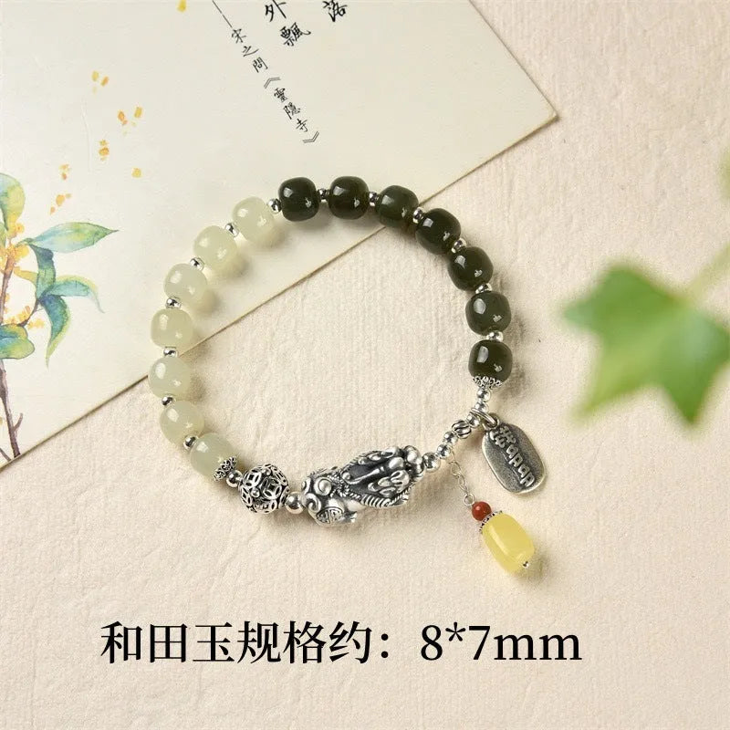 Retro women's bracelet with pure silver coin charm and natural Hetian jade bead