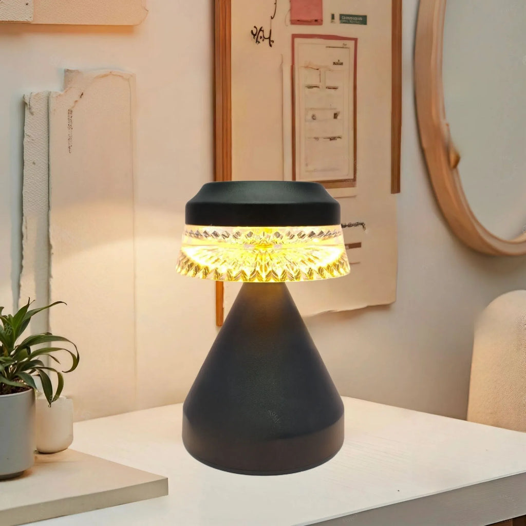 Black USB rechargeable LED bedside lamp with electrodeless dimming controls on a wooden nightstand.