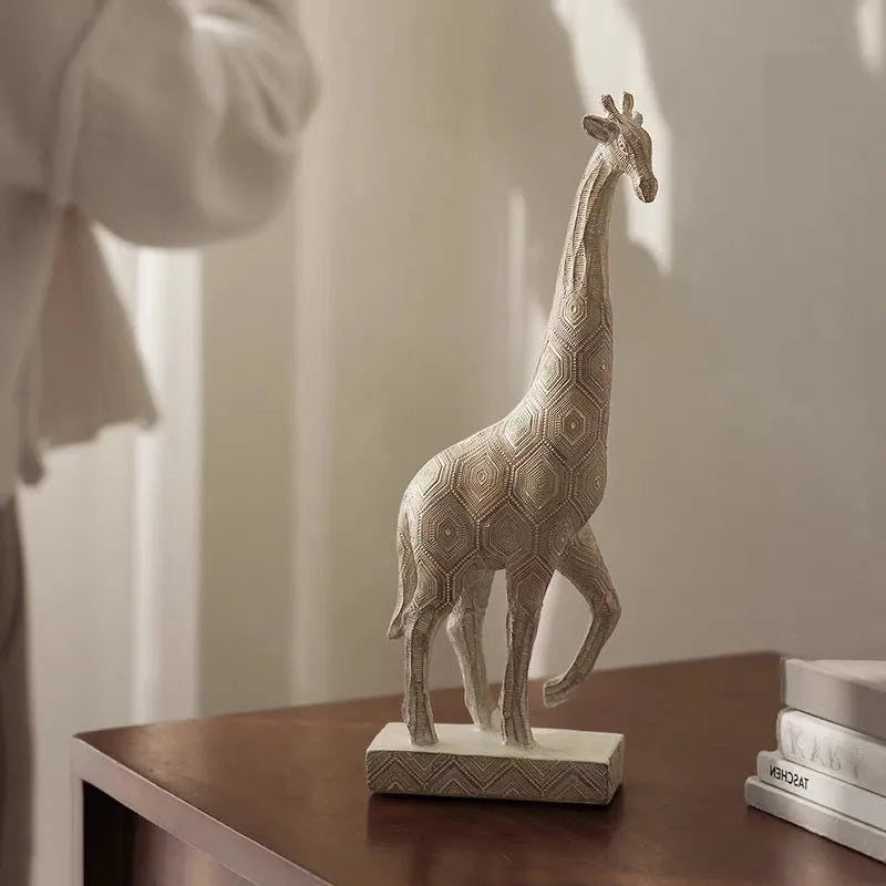 Wood colour synthetic resin giraffe ornament sculpture measuring 30.5cm tall on display.