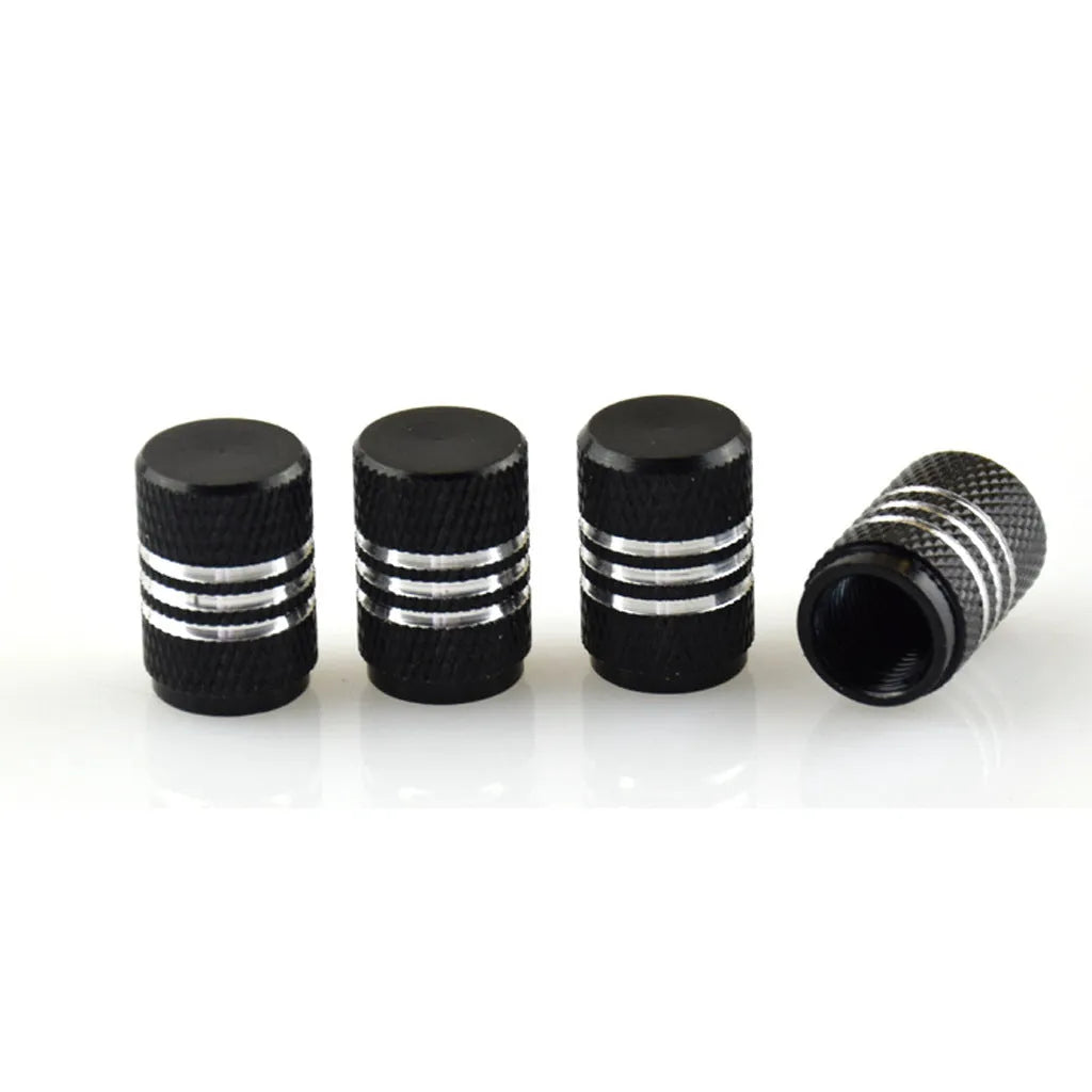 Set of coloured aluminium alloy car tyre valve caps showing black, red, blue, gold, and silver options.