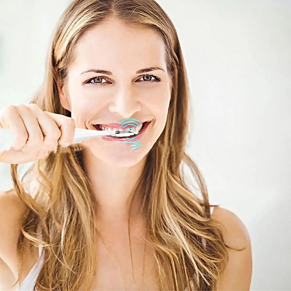 Electric toothbrush in white or black with 3 gears, USB charging, and optional 18mm or 20mm brush heads.