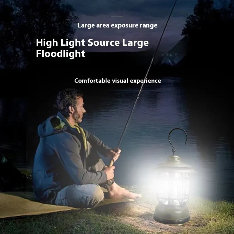 Portable camping lantern in dark green, black, or red colours, showing compact size with battery compartment.