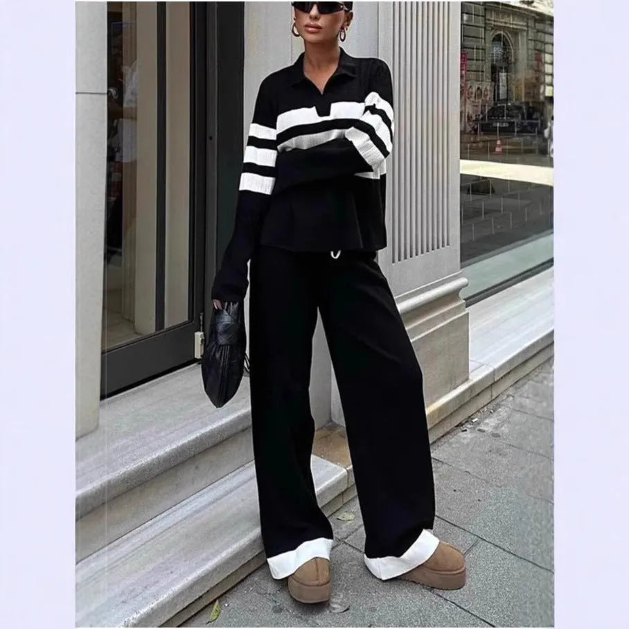 Women's black and white striped polo collar knit two-piece set with matching trousers