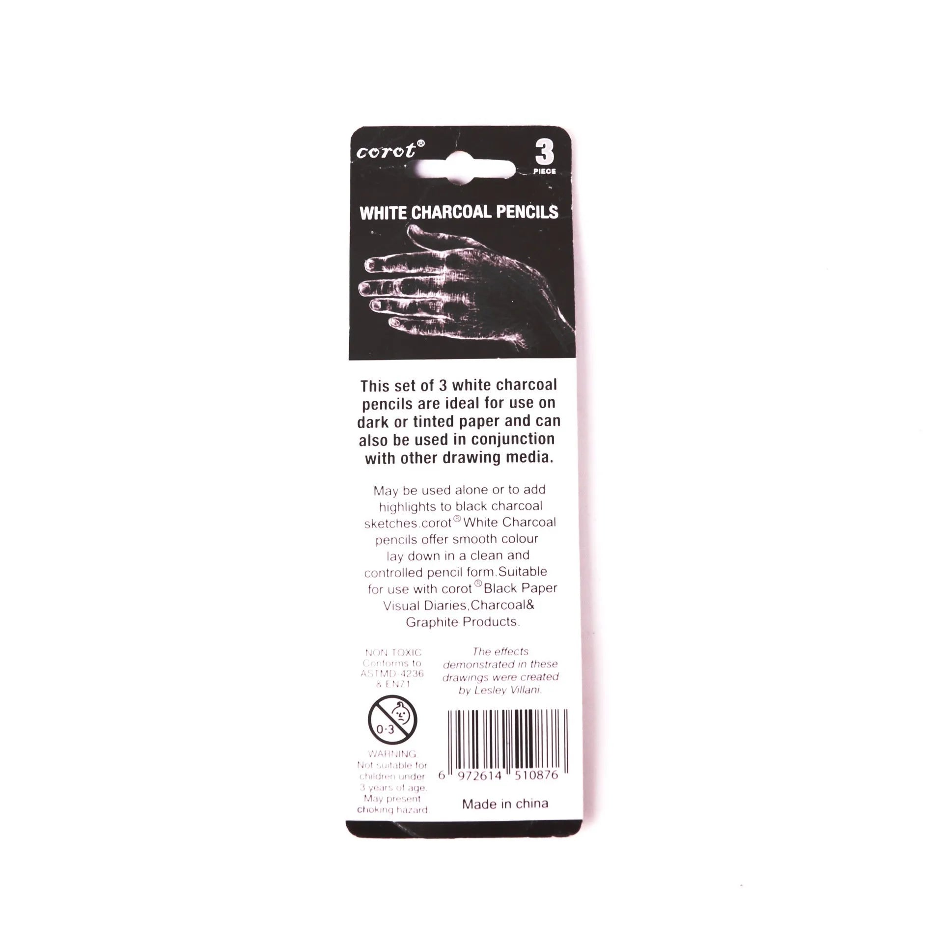 Three white charcoal pencils in wooden barrels for sketching and highlighting on dark papers