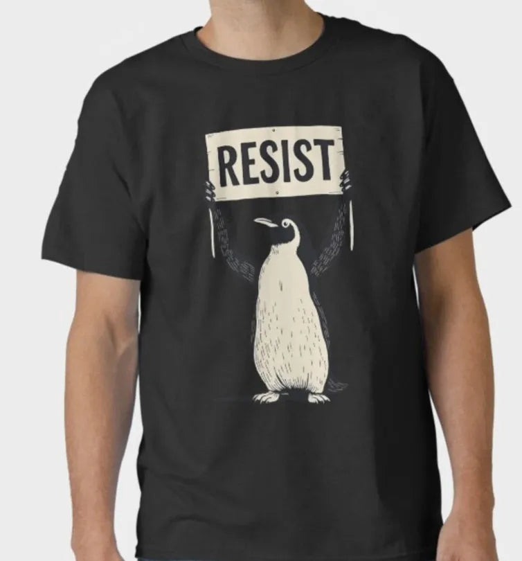 Loose-fit short sleeve cotton T-shirt in black, green, or white on a hanger.