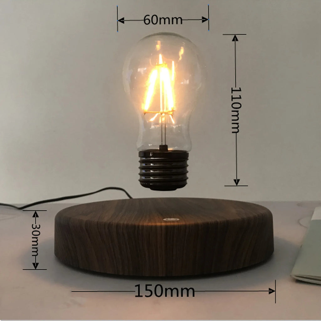Magnetic levitation bulb night light in solid wood colour floating above plastic base
