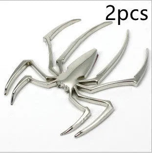 Three-dimensional zinc alloy spider emblem sticker in gold, measuring 7cm by 5cm.