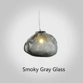 Modern fabric chandelier with glass shade in clear, amber, or smoke grey colour options.