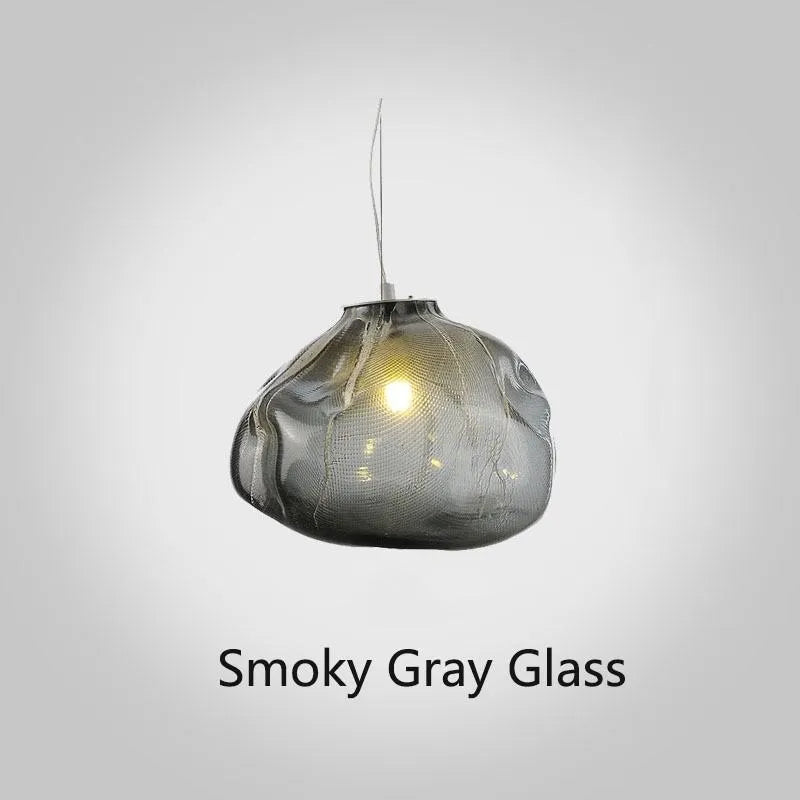 Modern fabric chandelier with glass shade in clear, amber, or smoke grey colour options.