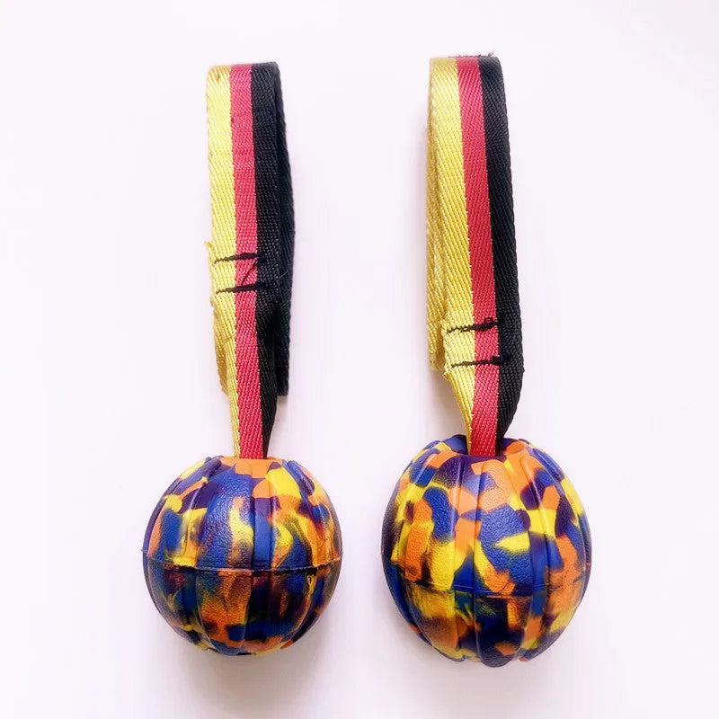 Camouflage and yellow floating pet tetherballs in three diameter sizes for water play
