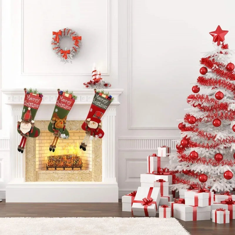 Three large red Christmas stockings with Santa, Snowman and Reindeer 3D applique designs