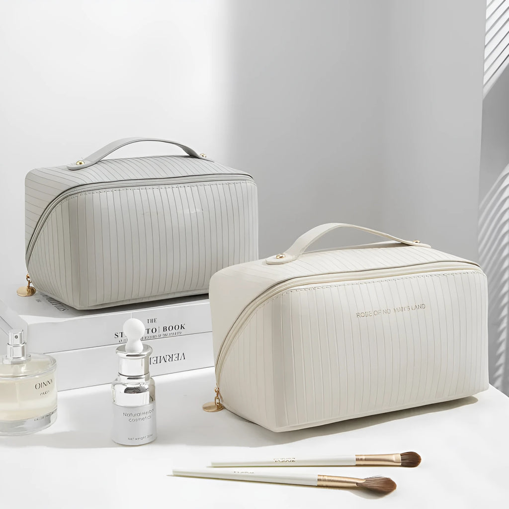 Vertical pattern pillow makeup bag in PU leather with cubic 22.5cm dimensions for travel storage