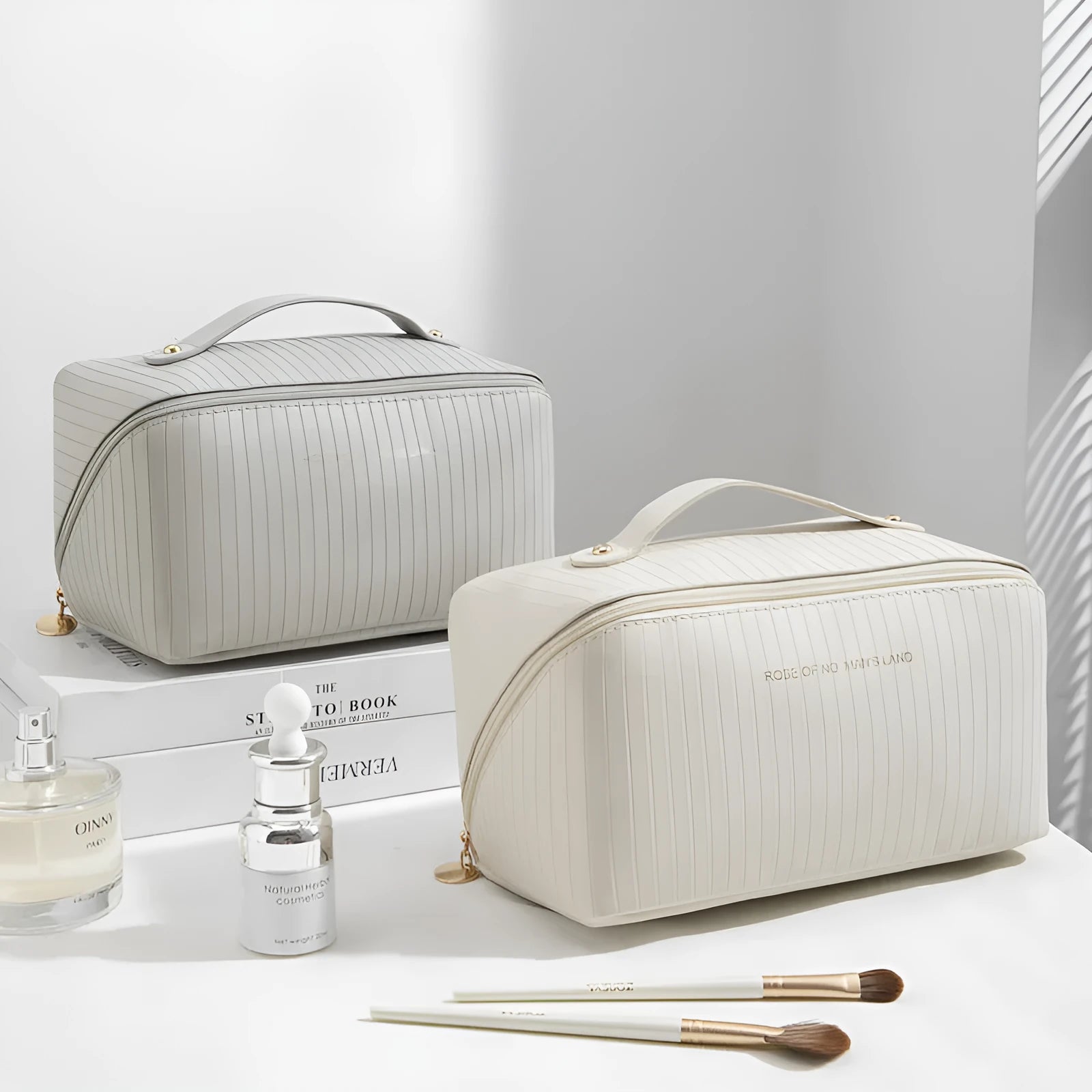 Vertical pattern pillow makeup bag in PU leather with cubic 22.5cm dimensions for travel storage