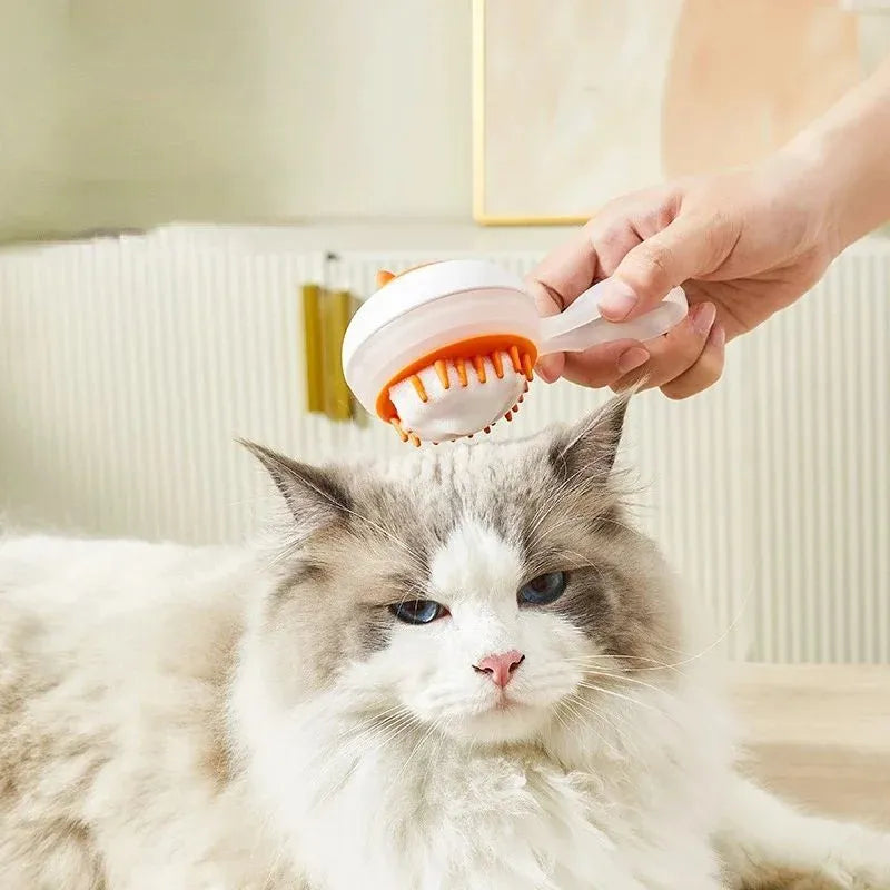 Automatic pet grooming brush with soft gel bristles in blue and orange colours
