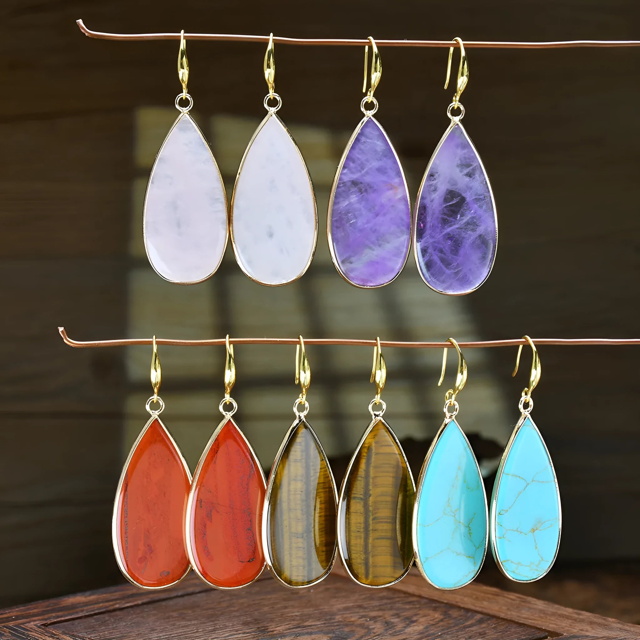Vintage long drop earrings made from Tigereye stone with water droplets design