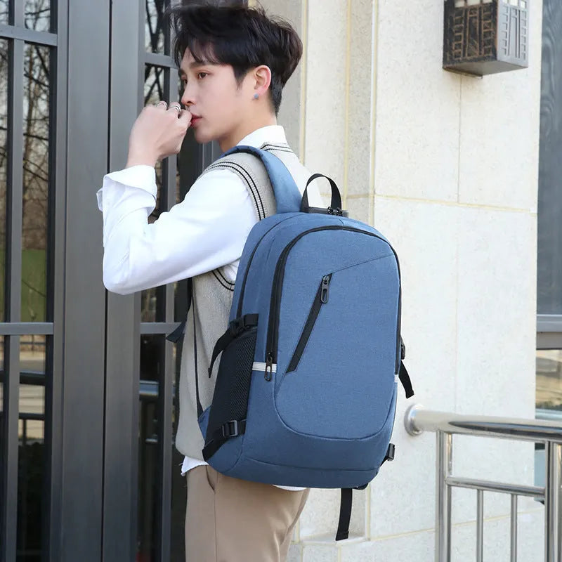 Solid-colour Oxford cloth computer backpack with 20-35L capacity in grey, black, blue, or red options.