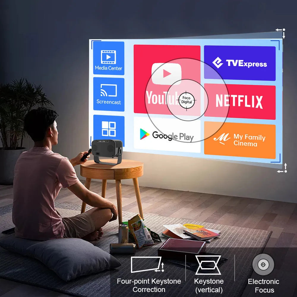 Black portable HD projector with Android system showing presentation on wall