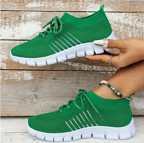 Women's high-cut lace-up platform sneaker in a choice of seven colours on a rubber sole.