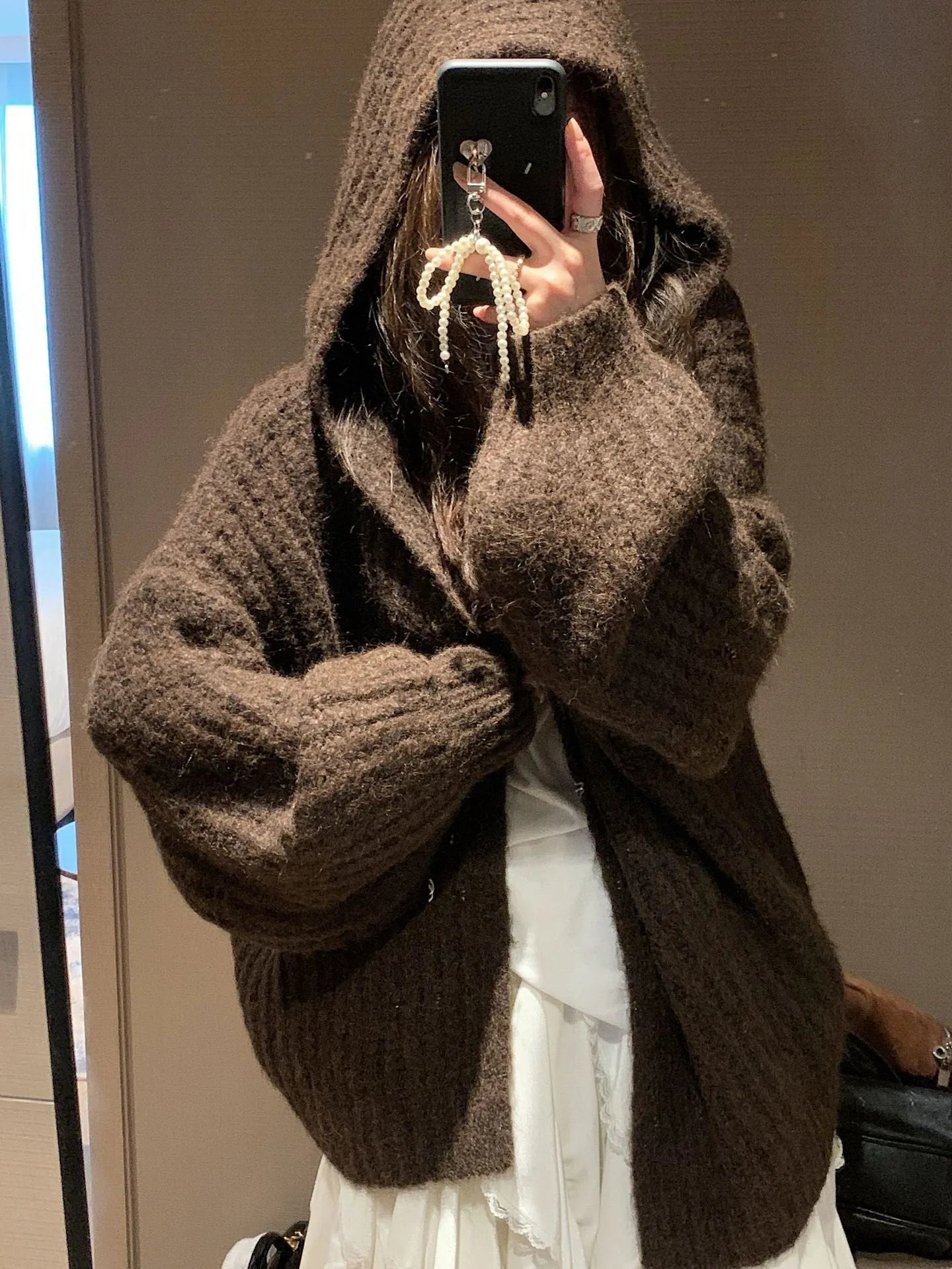 Women's retro-style thick hooded cardigan in dark grey, shown open as a sweater.