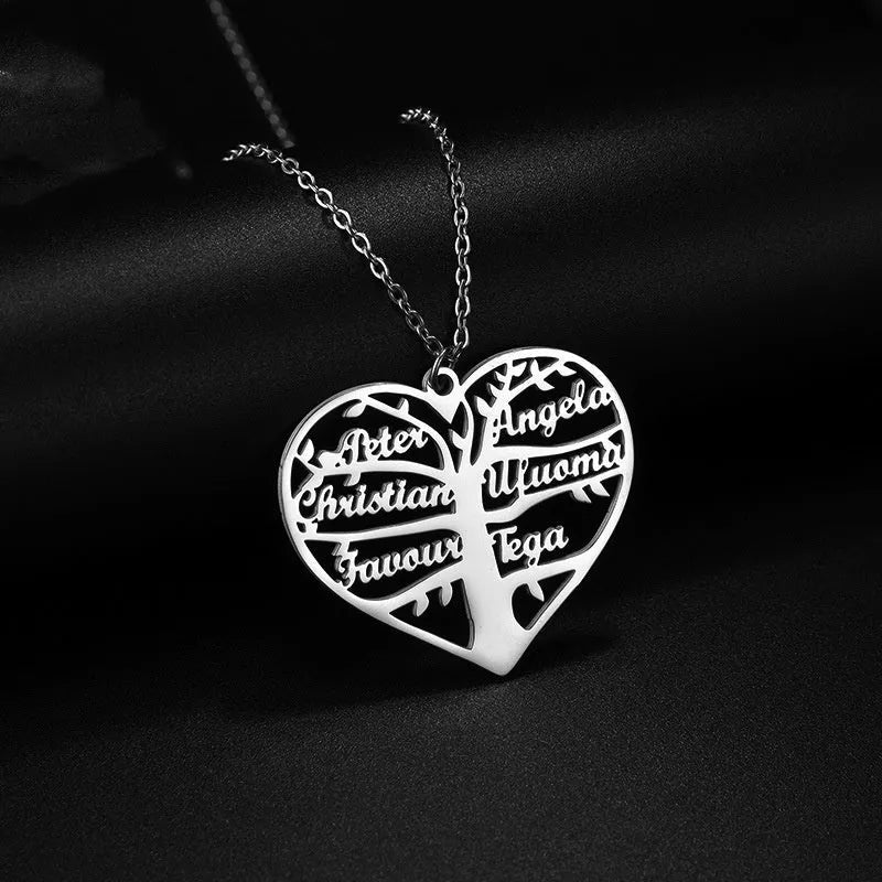 Silver personalised name necklace with hollow heart and tree pendant on a 50cm chain.