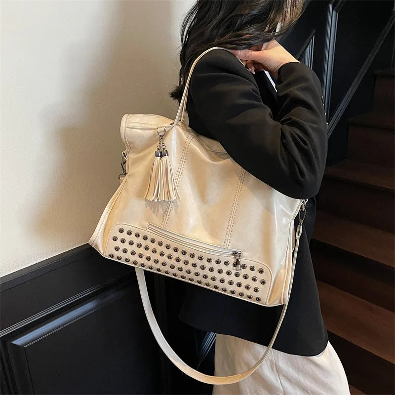 Women's messenger bag with rivet detail, large capacity, horizontal square shape, available in multiple colours