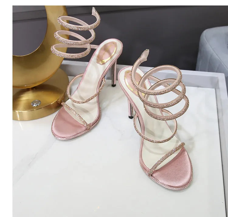 Women's rhinestone ankle-strap stiletto sandals with satin upper, round toe, and 10cm heel in silver colour