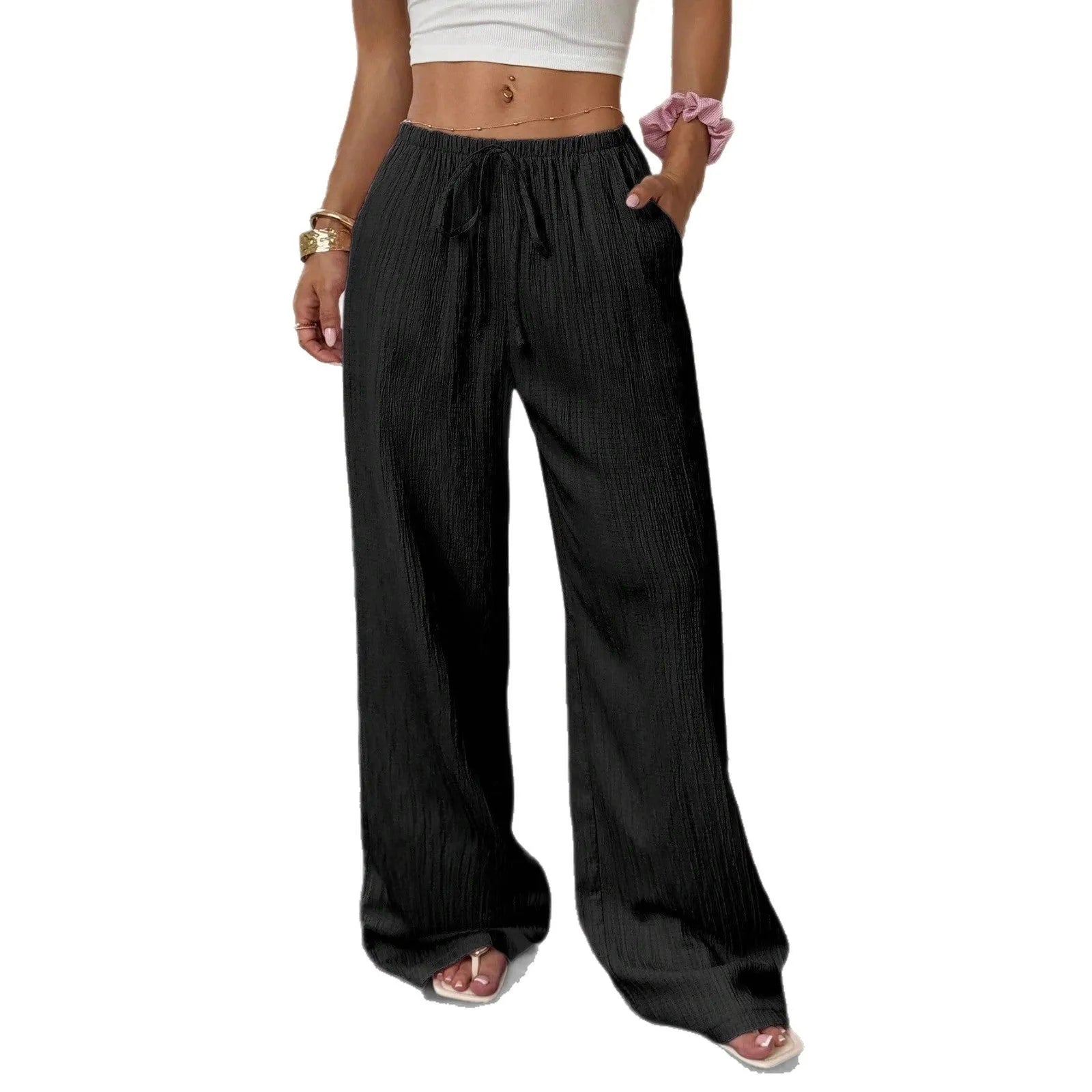 Women's black wide-leg trousers with a lace-up detail on the mid-rise waistband.