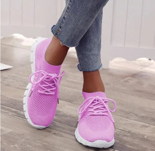 Women's high-cut lace-up platform sneaker in a choice of seven colours on a rubber sole.