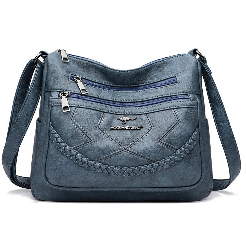 Soft PU leather women's shoulder bag in blue colour with crossbody strap