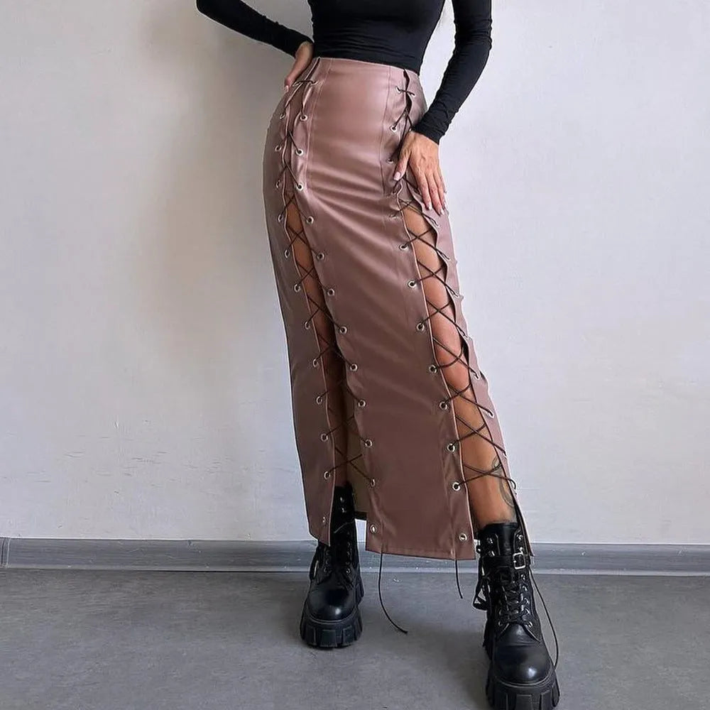 Women's black PU pencil skirt with slit and lacing detail, standing pose