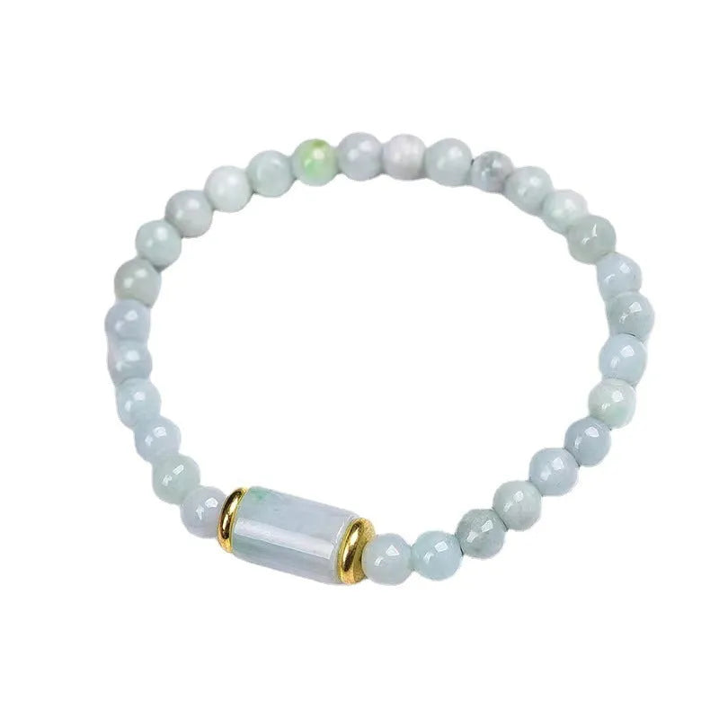 Myanmar Jade round bead bracelet in emerald green with geometric ethnic style design