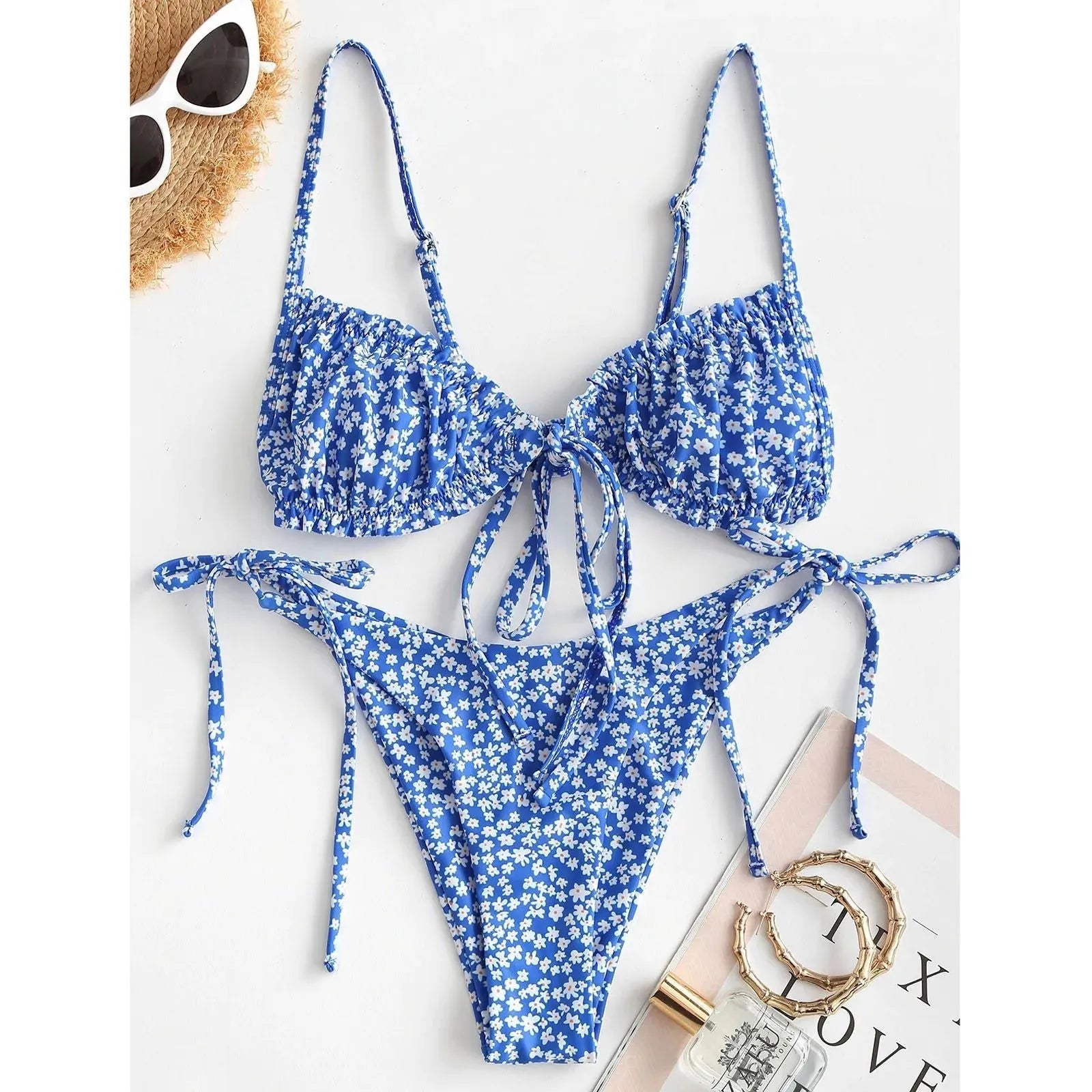Blue women's bikini swimsuit with printed rope band design, short sleeves, and a lapel collar.