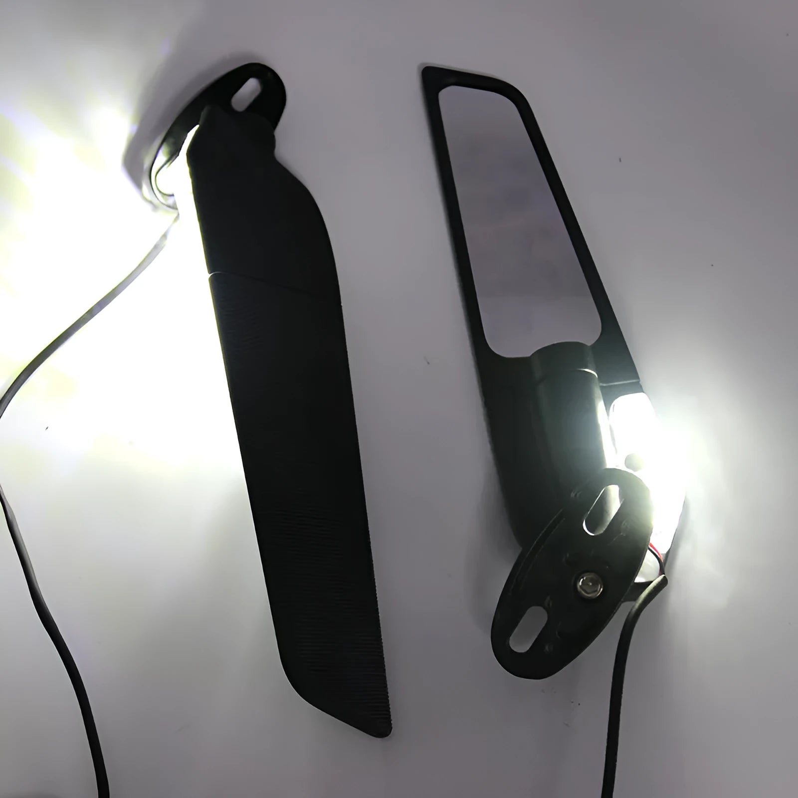 Pair of die-cast aluminium alloy motorcycle spoiler rearview mirrors with integrated yellow running lights and convex glass lenses.
