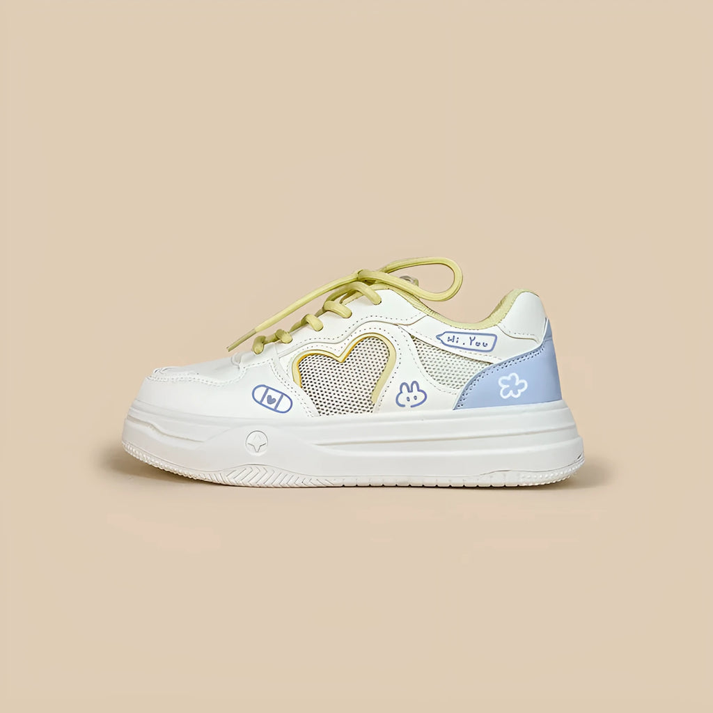 Meow Rabbit Sea Salt Cheese coloured sneakers with mesh cross straps and a thick rubber sole.
