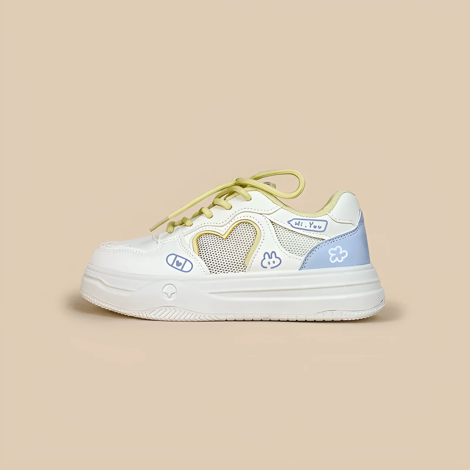 Meow Rabbit Sea Salt Cheese coloured sneakers with mesh cross straps and a thick rubber sole.
