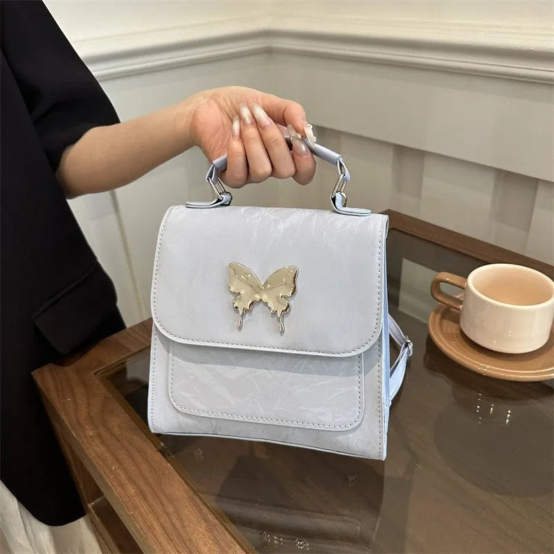 Women's preppy style PU backpack handbag with bow detail in choice of six colours