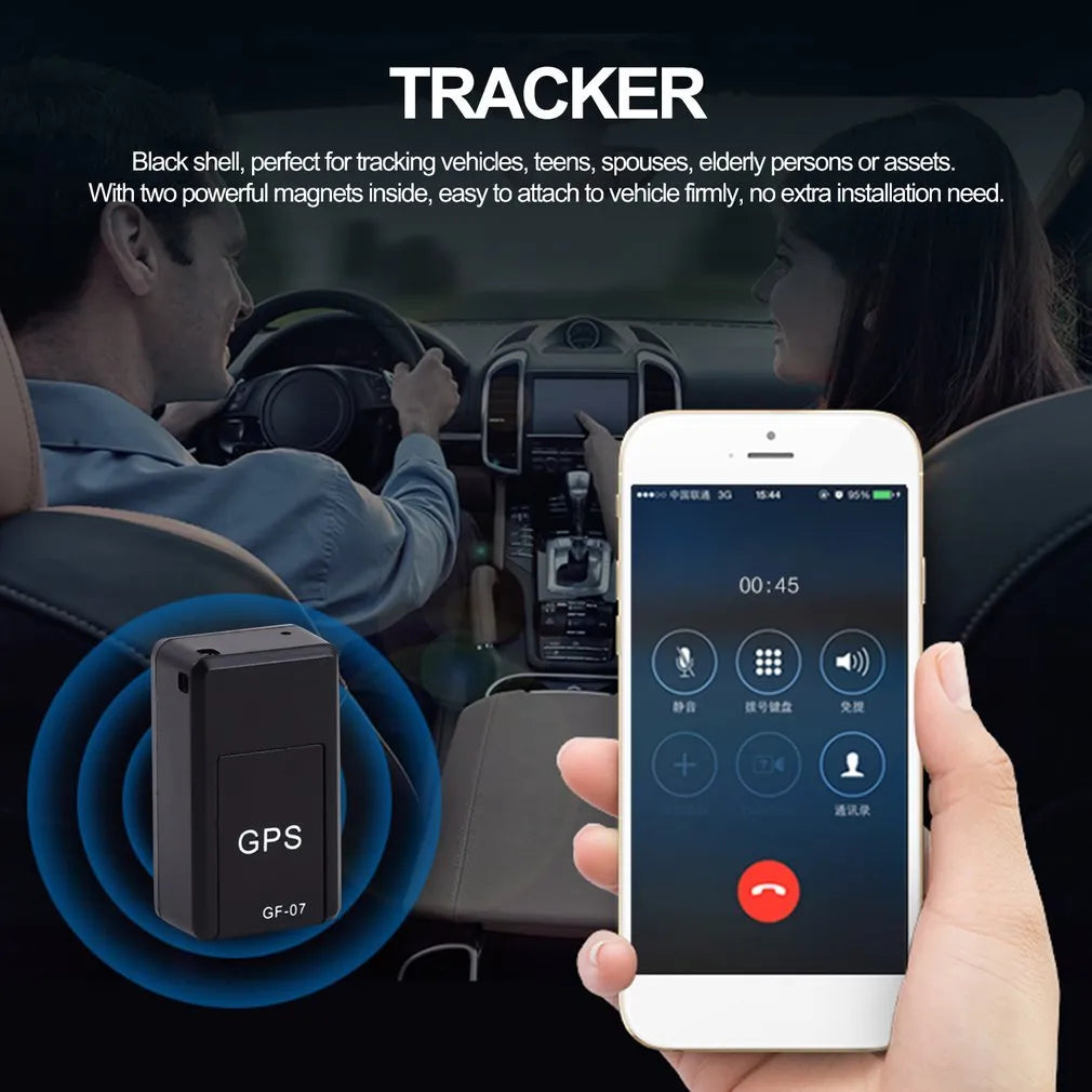 Small black magnetic GPS tracker device next to a USB charging cable.