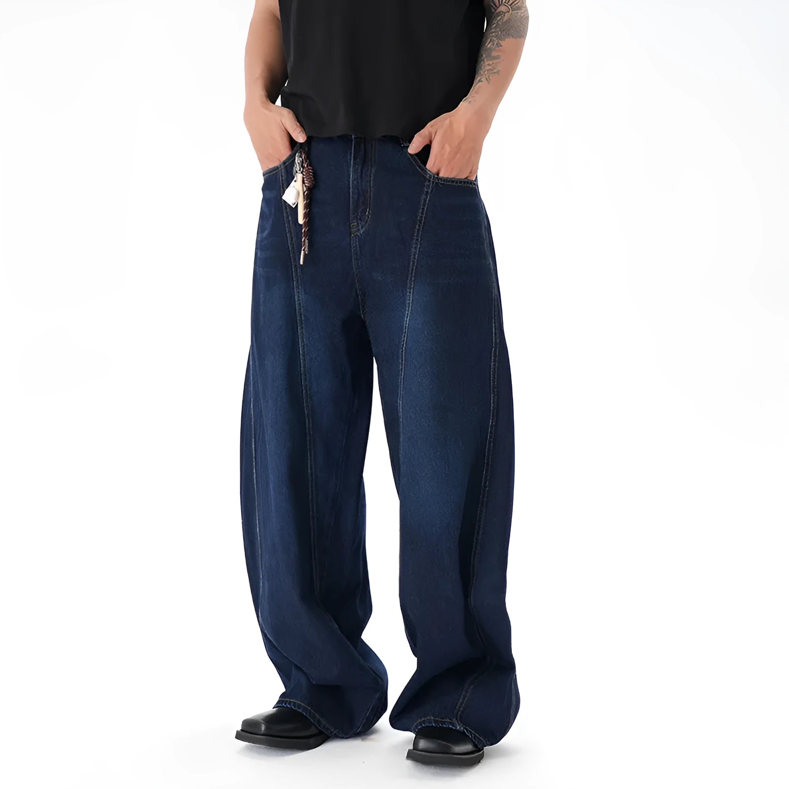 Dark blue wide leg women's jeans with a machete cut and distressed detailing on denim fabric.