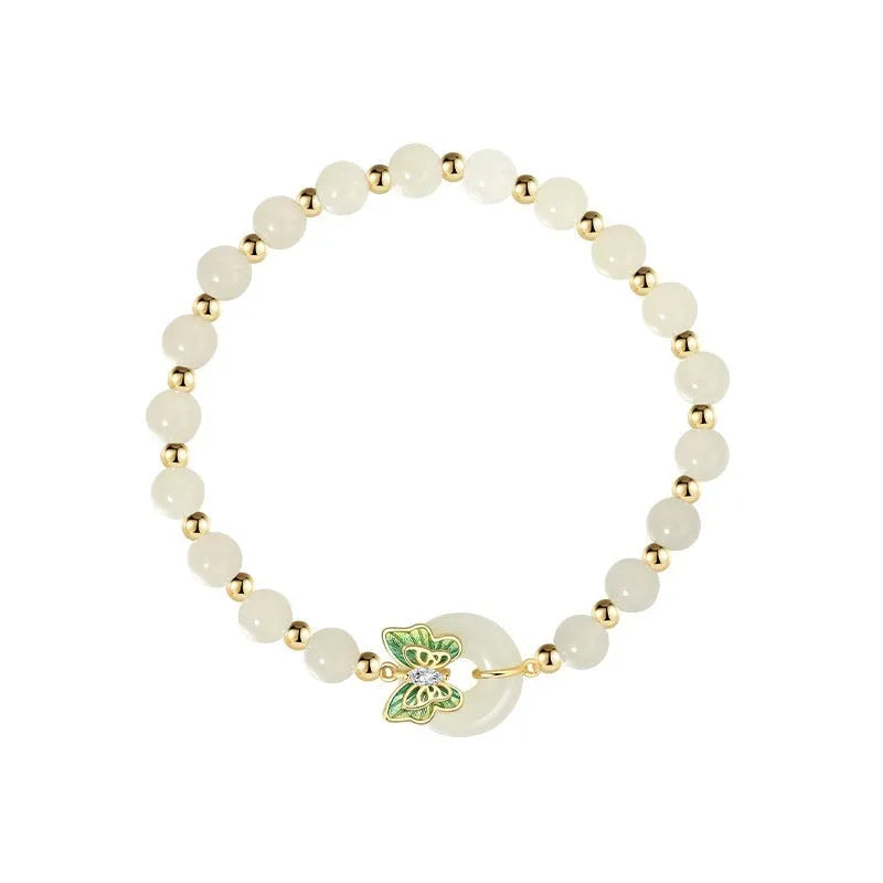 Cyan Hetian Jade bracelet with sterling silver butterfly design, 6mm beads.