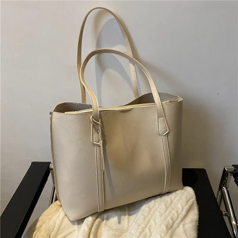 Large capacity soft leather tote bag in beige with synthetic leather lining and double shoulder straps