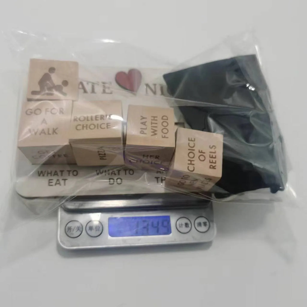 Wooden date night dice set for couples showing five dice, a rectangular planner board, and a black storage bag.