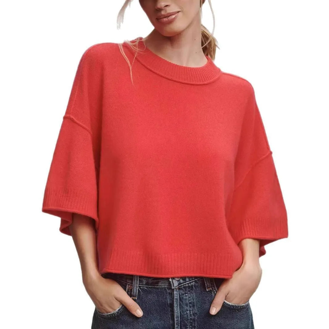 Red viscose short t-shirt with exposed navel detail on a mannequin, showing regular sleeves and pullover style.