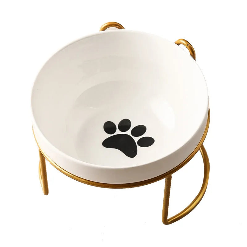 White ceramic pet bowl with cat footprints pattern in black iron frame with cat ears