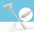 Electric beverage pump with blue silicone straws and a white press handle on a table.