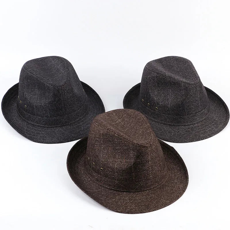 Men's black suit material fedora hat on a stand, showing classic brim shape.