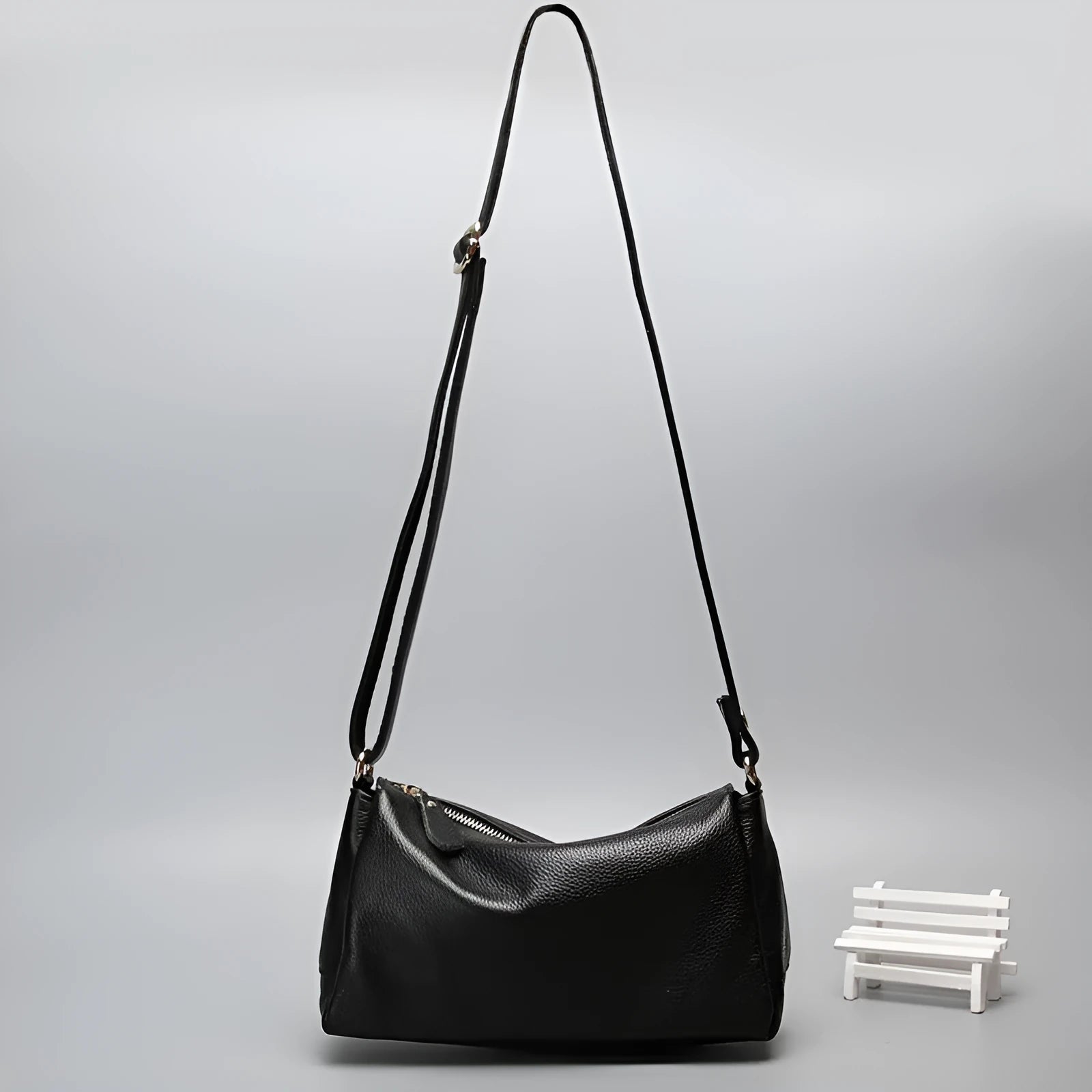 Women's genuine leather crossbody bag in horizontal square design with three-dimensional pocket