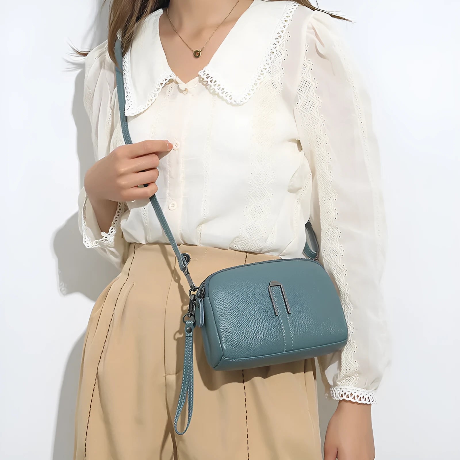 Genuine leather women's shoulder bag in urban square design, shown in dark khaki colour.