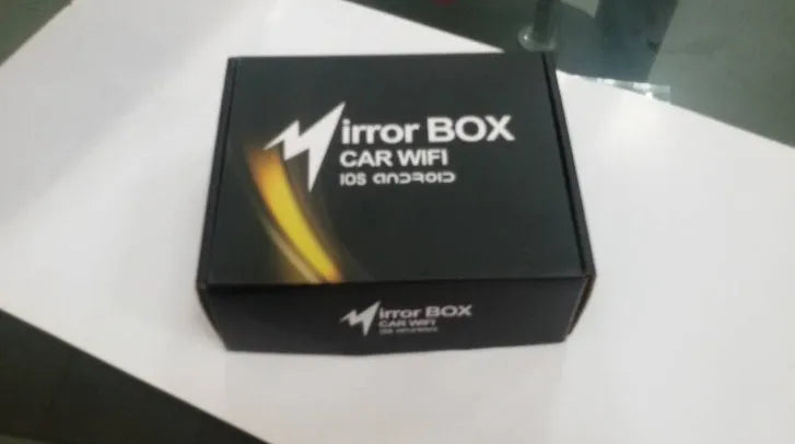 Black car Wi-Fi mirror box with AV converter, power cable, antenna and connection cables for smartphone integration
